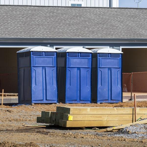 Portable construction toilet for an active job site